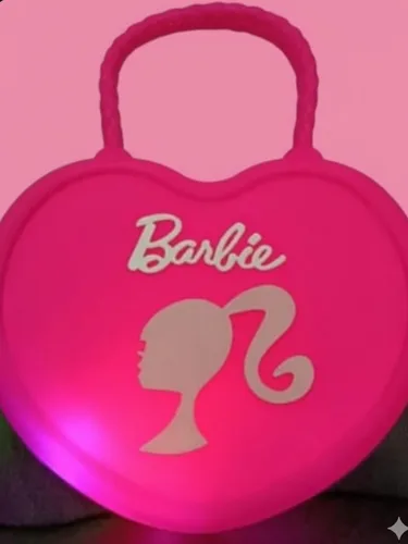 תיק יד בעיצוב ברבי זוהר מגיע עם שרשרת גם כתיק צד גוון ורוד